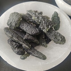 Moldavite pieces in a pile
